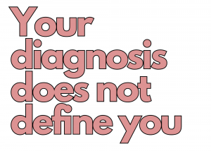 Pink lettering with a black border reading "your diagnosis does not define you"