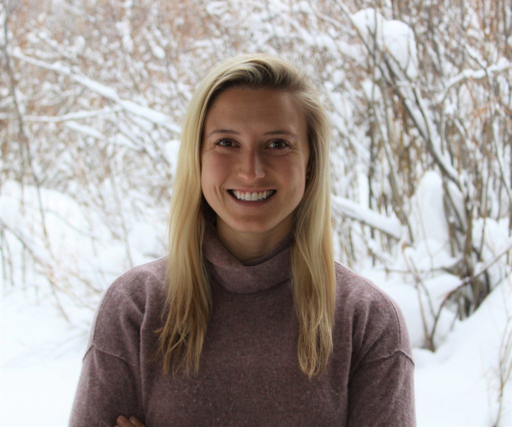 madison standing in front of a snowy background